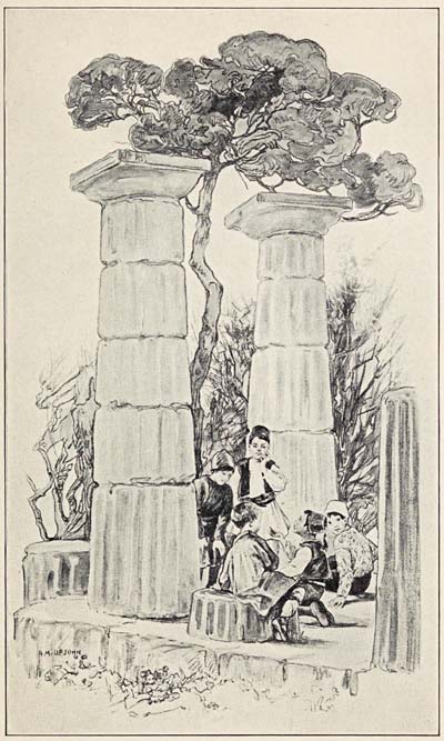 FIVE BOYS SAT MATCHING PENNIES ON THE FLOOR OF
A TEMPLE