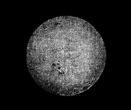Fig. 46.

Photograph of the face of the sun, taken by Mr. Selwyn, October 1860,
showing spots, faculÃ¦, and mottled surface.