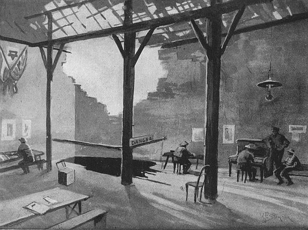 THE Y.M.C.A. IN A RUINED WAREHOUSE. SHELL-HOLE IN FLOOR OF CANTEEN