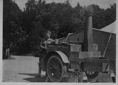 CHOW
The rolling kitchens, builded on trailers to motor trucks, brought hot drinks and food
right up to the men in action