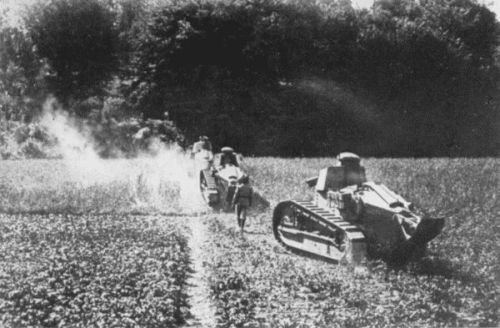 FIRST OF THE GREAT FRANCO-AMERICAN COUNTER-OFFENSIVE AT CHÃTEAU-THIERRY.
THE FRENCH BABY TANKS, KNOWN AS "CHARS D'ASSAUTS,"
ENTERING THE WOOD OF VILLERS-COTTERETS, SOUTHWEST OF SOISSONS