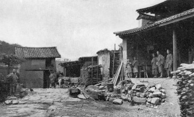 THE "EAGLE NEST BARRIER" ON THE ROAD BETWEEN YUNNAN AND
TALIFU.