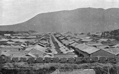 THE SUBURB BEYOND THE SOUTH GATE OF TENGYUEH. (Stalls
under the Umbrellas.)