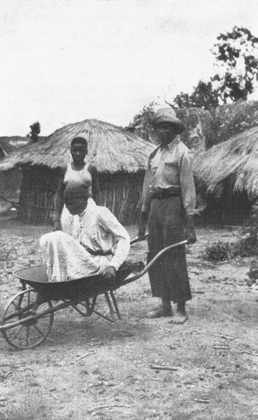 Kwidine Taking His Aunt to Church.
Matopo M. Hospital.