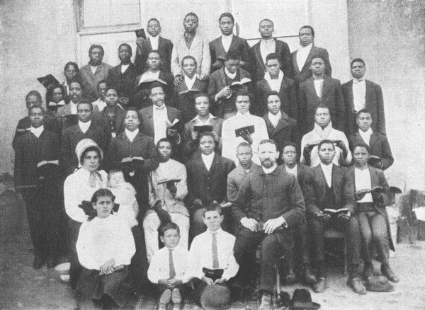 Mr. and Mrs. Isaac O. Lehman and Family and Some of Our Workers, Members
and Enquirers. Nos. 1, 2, 3, 4, 5 and 6 Are Satisfactorily Engaged in
Work and in Preparation for the Work as Evangelists.