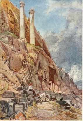 THE CAVERN CHAPEL (PANAGIA SPELIOTISSA) ON THE SOUTH SIDE
OF THE ACROPOLIS

This is the site of the Choragic monument of Thrasyllus. The square
opening is cut in the scarped face of the Acropolis rock at the top of
the Theatre of Dionysos. Above stand two columns, which supported
tripods dedicated to the god.