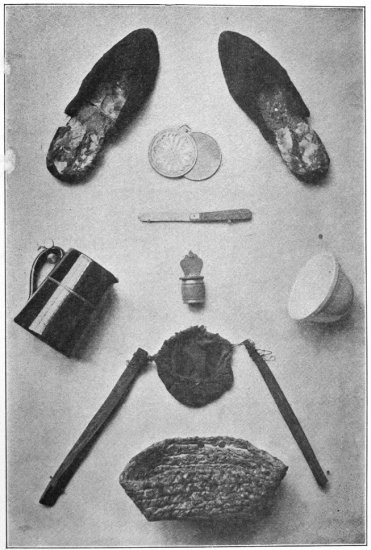 Photo by Claude Harris, London

OBJECTS I USED IN PRISON

Slippers made by myself.

Penny looking-glass—only kind allowed by the prison authorities.

Blunt knife.     Salt Cellar.     Jug.       Basin.

Coffee Strainer—made by myself with fire-wood sticks, some linen and
wire taken from my hat.

Breadbasket—made by myself with paper.
