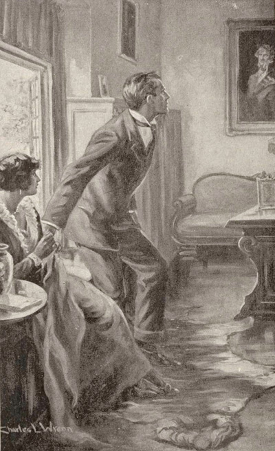 ““With an exclamation he rose, and walked across the room”