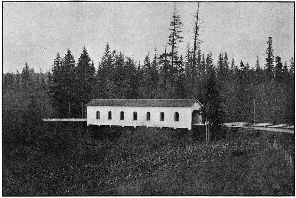COVERED WOOD BRIDGE
OVER THE TUALATIN RIVER ON THE WEST SIDE HIGHWAY IN WASHINGTON COUNTY BUILT IN 1918