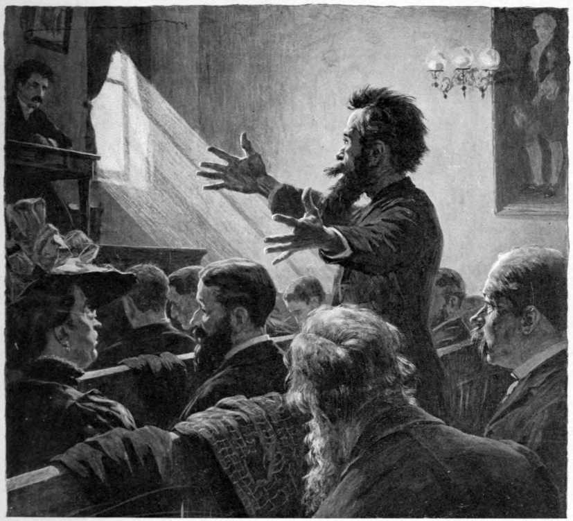 Several people are seated in pews.
One man is standing exclaiming passionately.
A dais with a seated man is visible in the background.